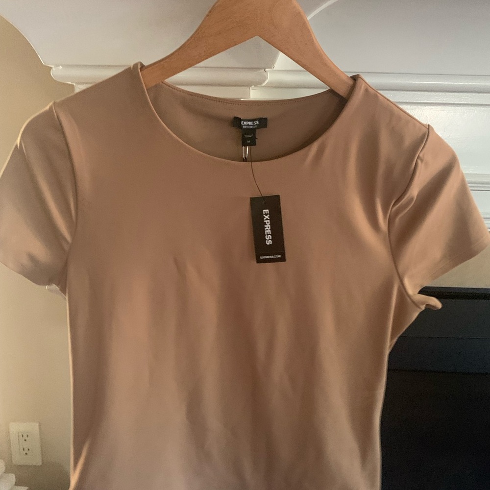 Super cute beige top from express. New with tags
